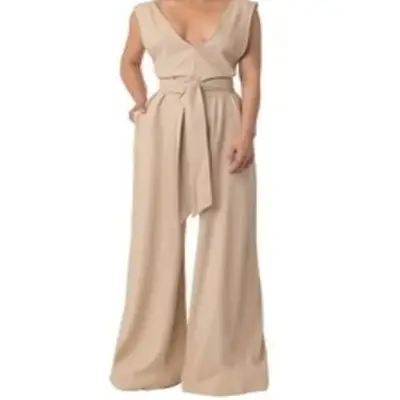 Model wearing a Tan Deep V-Neck Linen Jumpsuit