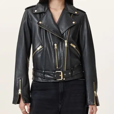 AllSaints Balfern Leather Biker Jacket in black and gold on model
