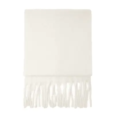 Audrey Hepburn wears a silk scarf on head and a houndstooth coat