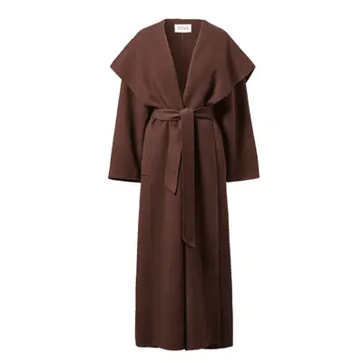 Good American Good Legs Straight Light Compression Jeans in medium wash denim on model