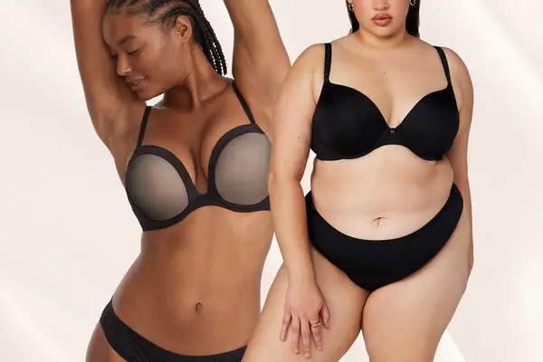 Two women wearing push-up bras in their underwear collaged on a pale flesh-toned background