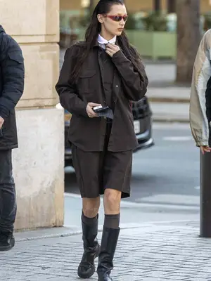 bella hadid brown outfit with tie and red sunglasses