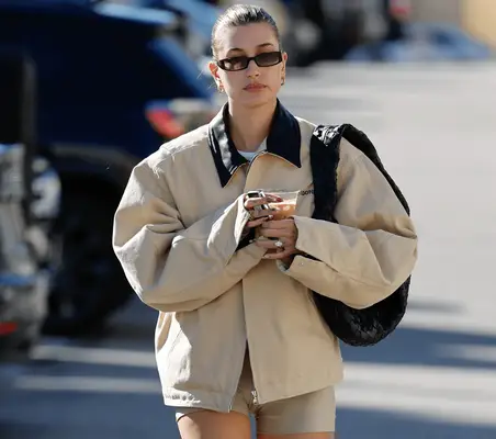 Hailey Bieber wearing biker shorts. 