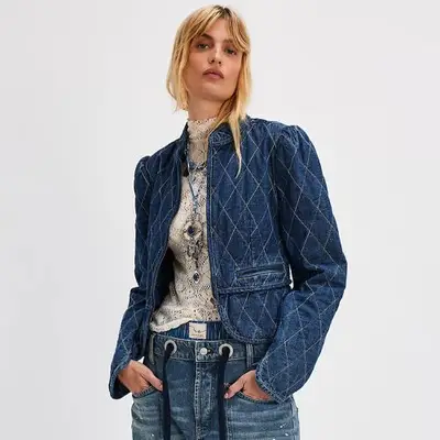 Free People Peggy Quilted Jacket in dark denim on model