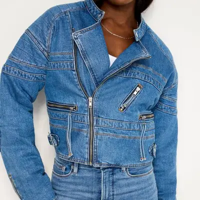 Good American Denim Moto Jacket in medium wash indigo on model