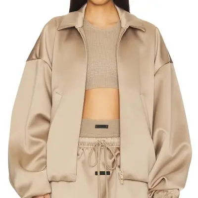 Fear of God Essentials Satin Bomber Jacket in desert sand on model