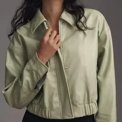 Maeve Faux Leather Deep V-Neck Bomber in moss green on model