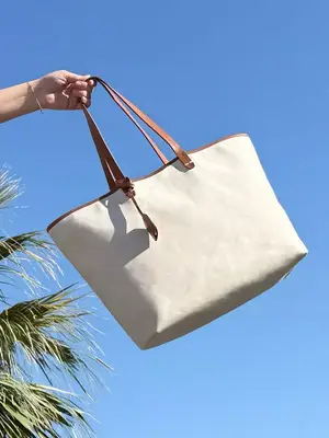 Oryany Croissant Woven Leather Shoulder Bag in sand beach