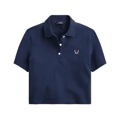 Model is wearing a mini dark wash skort 