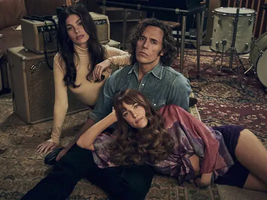 Riley Keough, Sam Claflin, and Camila Morrone in Daisy Jones & The Six