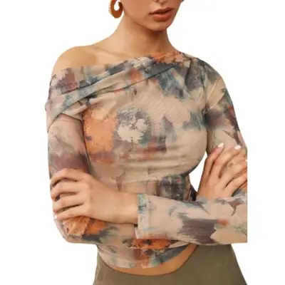 model wearing a printed mesh top