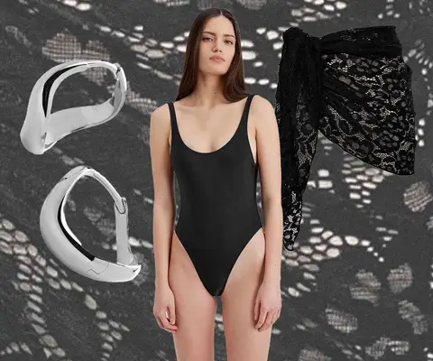 Silver abstract hoop earrings, black one-piece swimsuit on model, and lacy black sarong