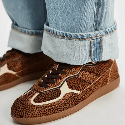 Alohas 490 Rife Animal Print Sneaker in leopard on model styled with jeans