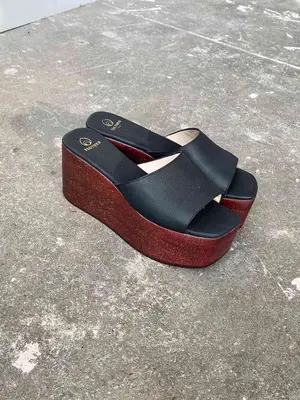 Dior Forever Dior Heeled Slide in black calfskin with gold logo detail