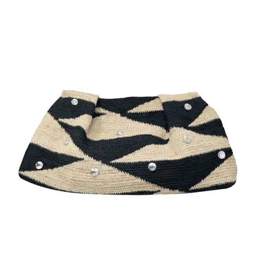 black and tan large woven clutch with crystals