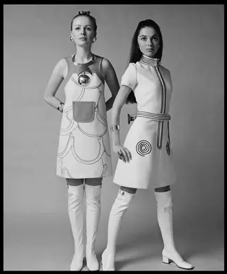 Two women wearing over the knee boots