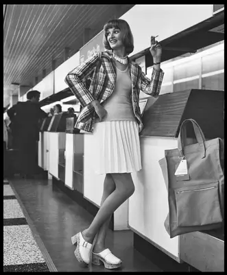 Woman wearing pleated skirt