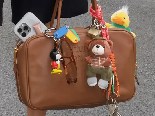 bag covered in charms and trinkets