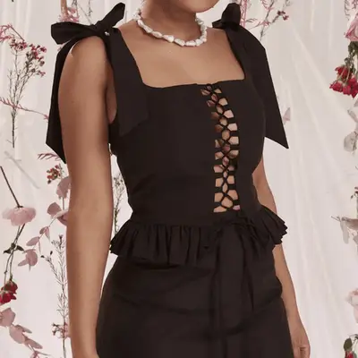 Poetic Justice Tina Faux Fur Trim Trucker Jacket on model styled with pink jumpsuit