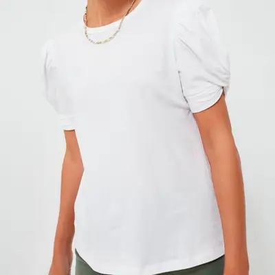 Pomander Place White Vesty Puff Short Sleeve Crewneck tee on model with gold chain necklace