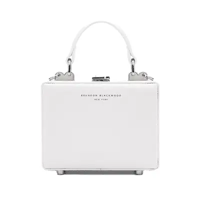 Brandon Blackwood Mini Kendrick Trunk in white grain leather with silver hardware