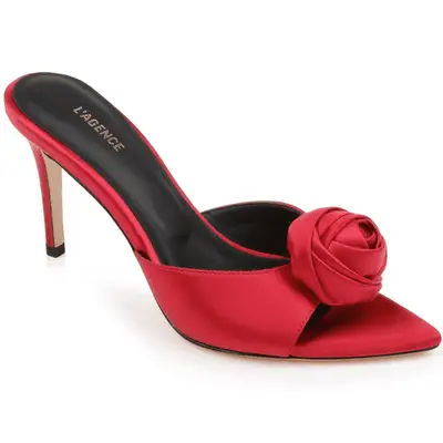 Photo of red satin mule with a rose on the front of the shoe