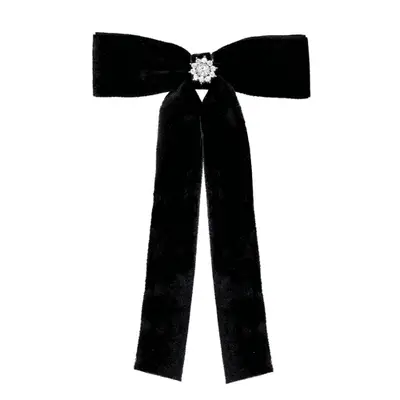 Photo of black velvet bow with crystal adornment 