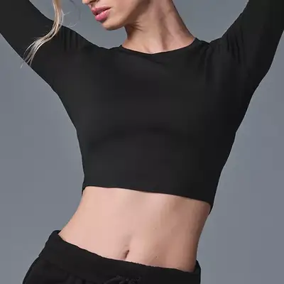 Alo Yoga Alosoft Crop Finesse Long Sleeve in black on model