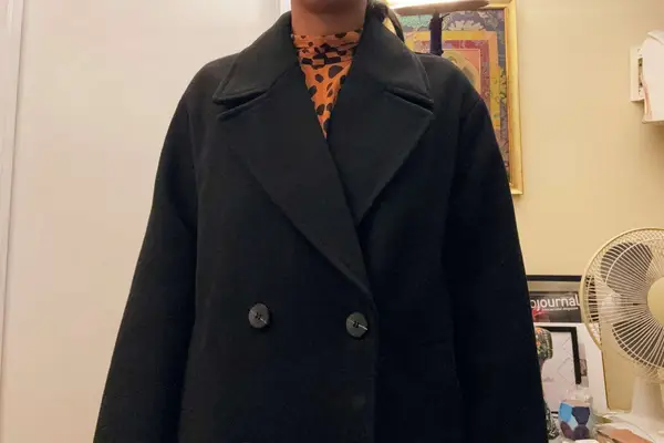 A person wearing the Zara Soft Oversized Coat