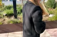 The side of the Babaton The Constant Coat on a person