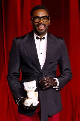 Colman Domingo holding the Valentino cat purse
