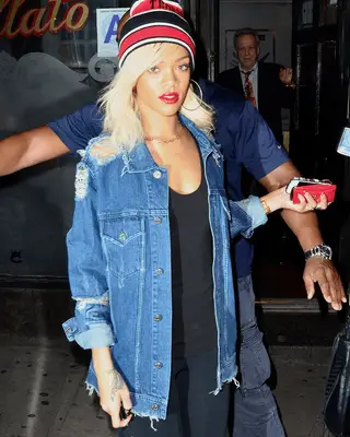 Rihanna wearing a denim jacket in 2012