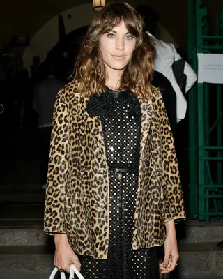 Alexa Chung wearing a leopard print jacket in 2009 
