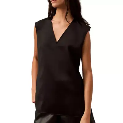 model wearing a black v-neck top