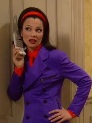 Fran Fine on phone wearing a red headband, red blouse, and purple jacket