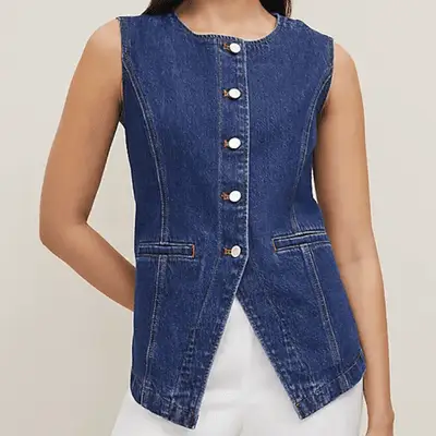 Ann Taylor Refined Denim Vest in medium wash on model