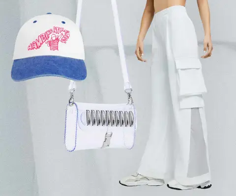 White and Blue Dad Hat with Pink Graphic, Clear Hand bag, White Wide Leg Sweats