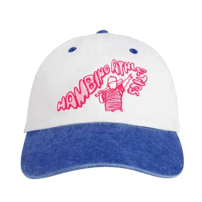 model wearing white headband with bangs out