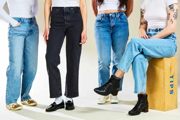 a group of women wearing petite jeans