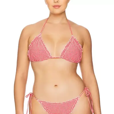 model wearing a gingham red bikini top