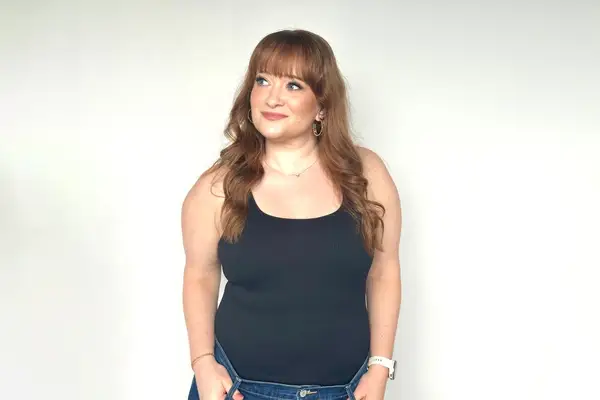 Woman wearing black bodysuit