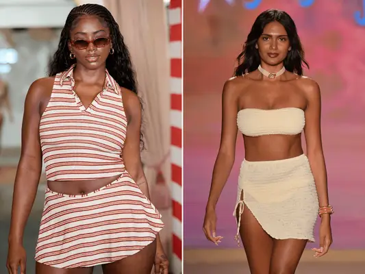 Two models walking down a runway in fashion ensembles, left model in striped outfit, right model in a matching top and skirt