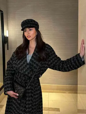 Cult Gaia Rue Embellished Drawstring Wristlet in shell pink