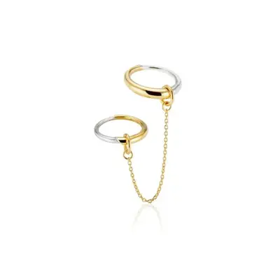 gold and silver ring set attached by chain