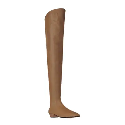 The Row Awar Knee Boot in leather in fawn light brown