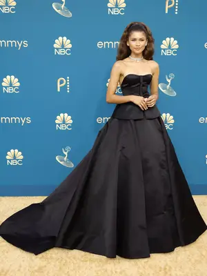 Zendaya wears a black Valentino gown and Bulgari jewelry to the 2022 Emmy Awards