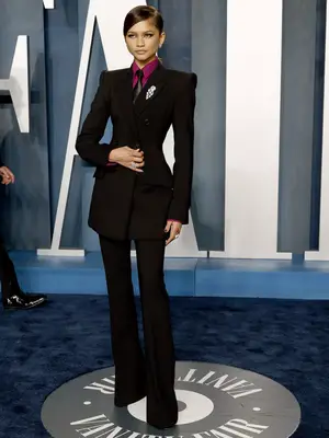 Zendaya wears a Sportmax suit and tie to the 2022 Vanity Fair Oscar afterparty