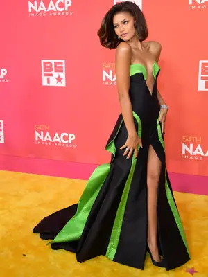 Zendaya wears a vintage black and green Versace couture dress and bob hairstyle to the 2023 NAACP Image Awards