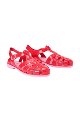 A pair of red and pink Boden jelly shoes set against a white background.