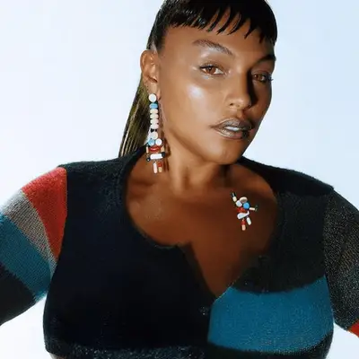 woman wearing a bolero as a top